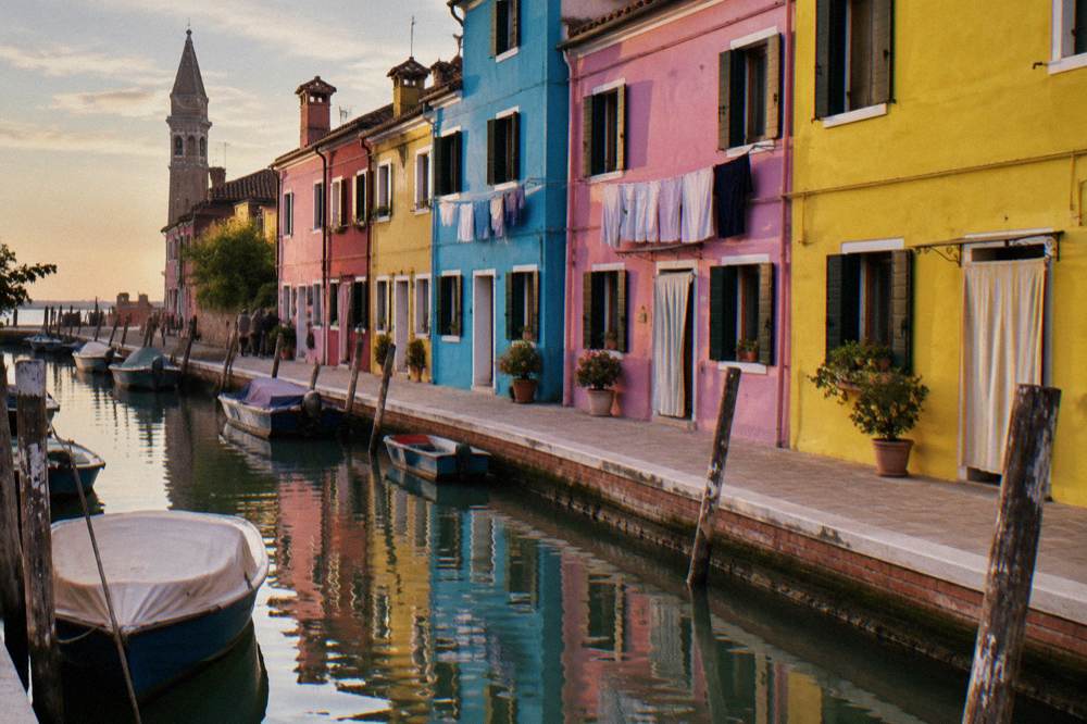 Colourful painted houses along a canal on the island of Burano