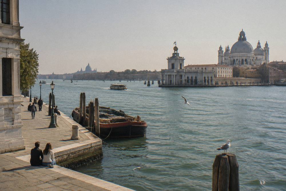 Waterfront point where two canals meet, seen from a Venetian street